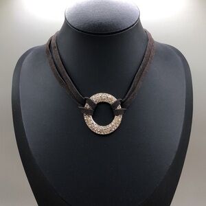 Jules sude like corded dazzling rhinestone circular choker necklace.
